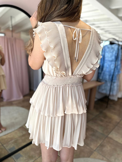 Gasa beige olanes plisados