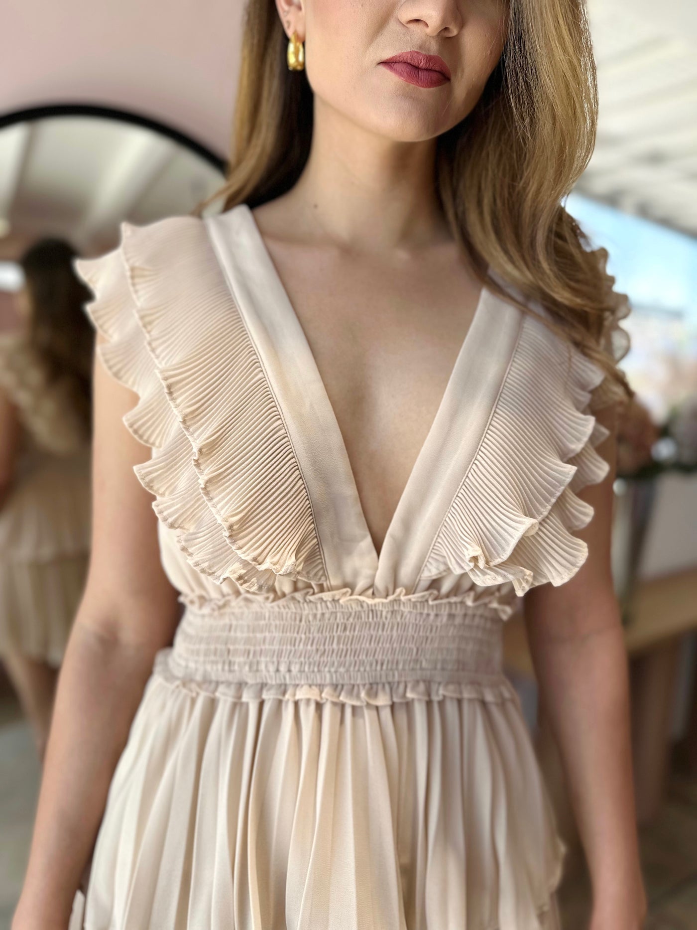 Gasa beige olanes plisados