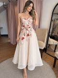 Vestido vainilla con rosas